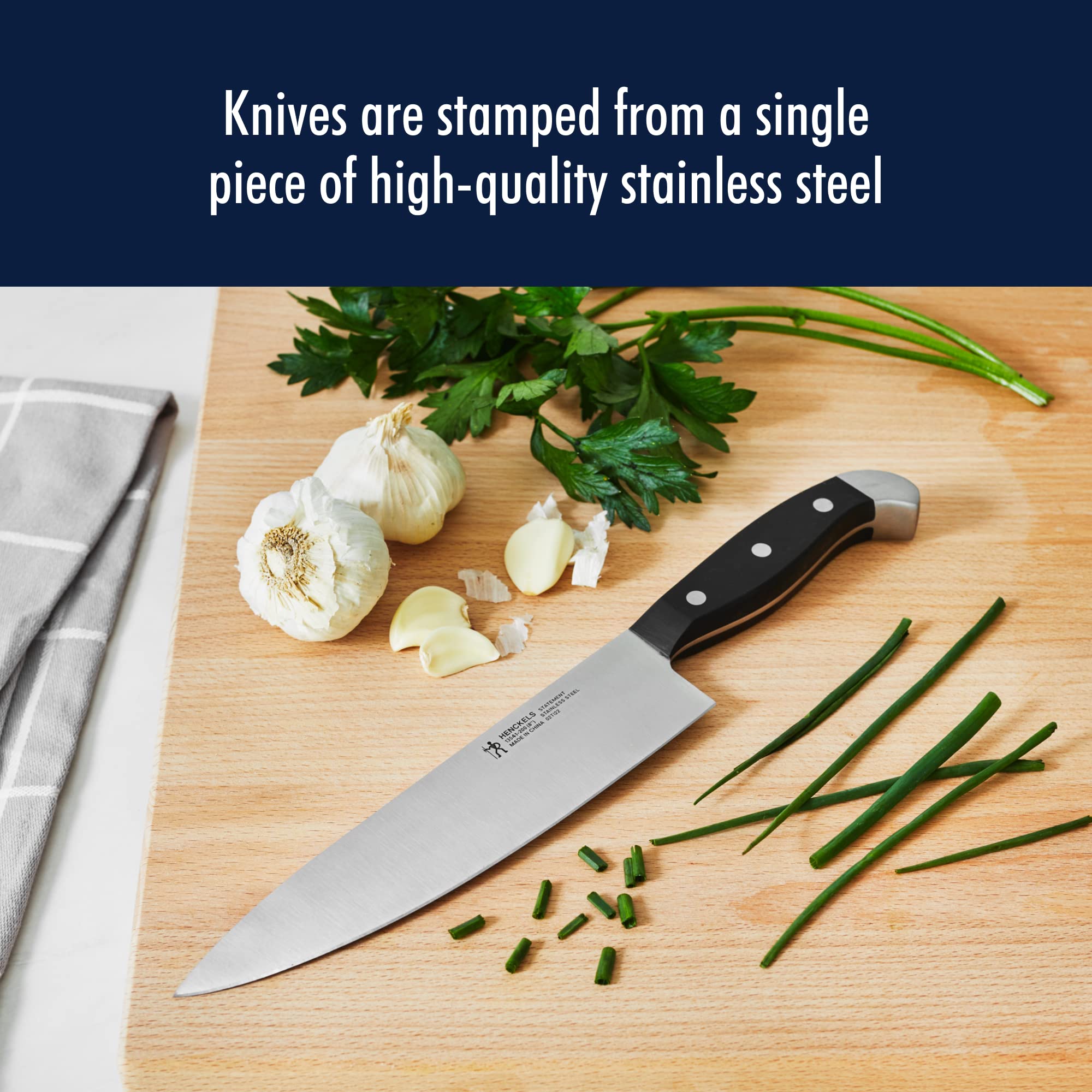 Henckels Statement 7-inch santoku with grantons for light, non-stick cutting