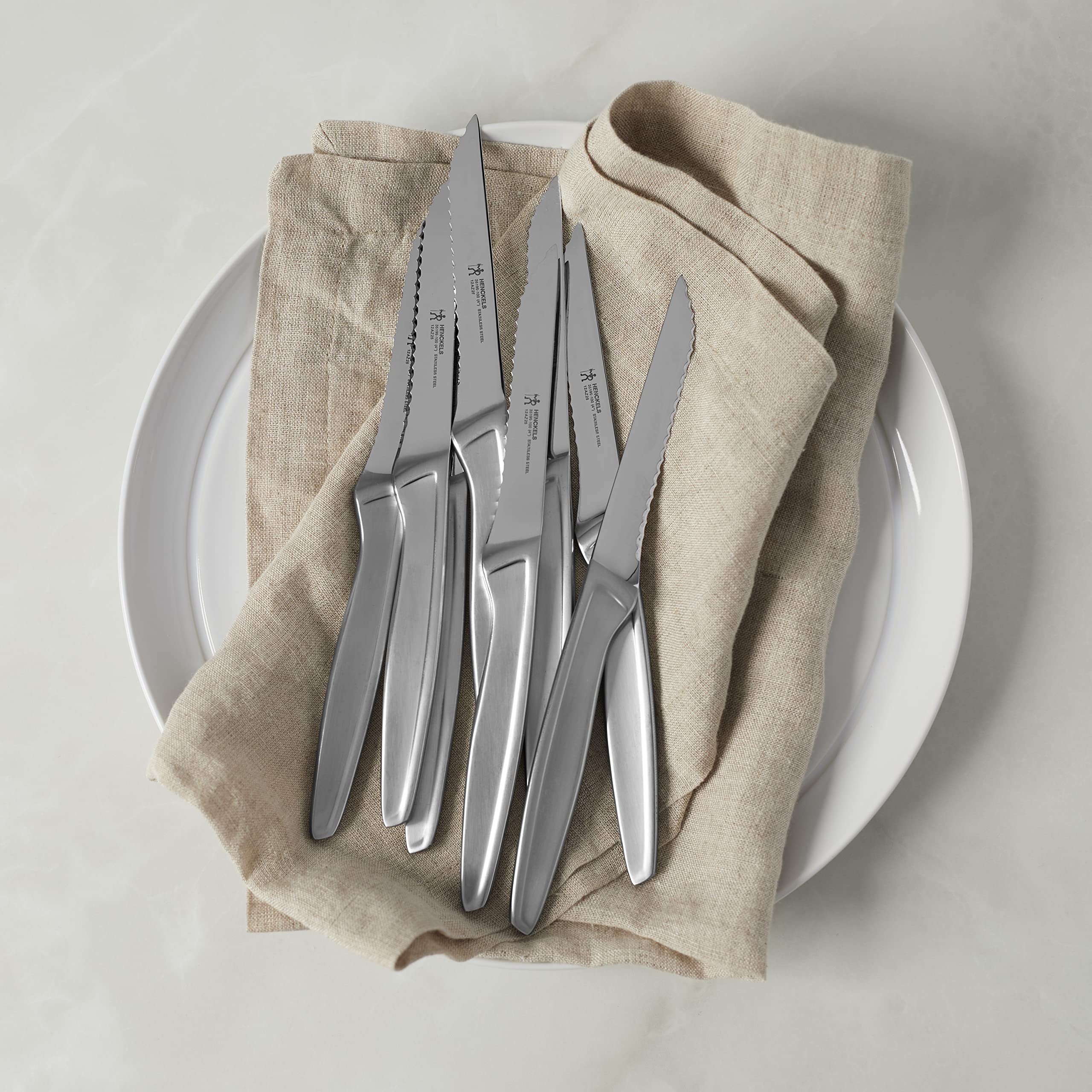 Henckels steak knives with dishwasher-safe blades for quick cleanup