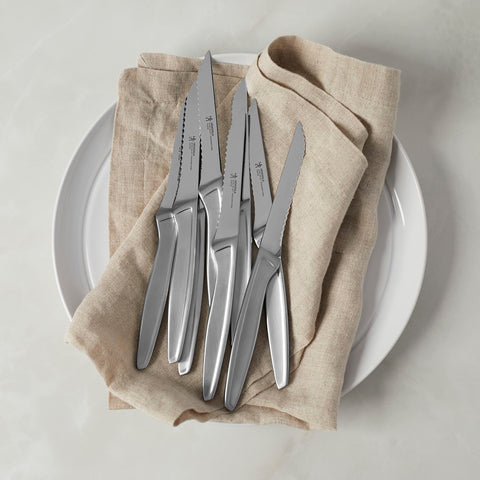 Henckels steak knives with dishwasher-safe blades for quick cleanup