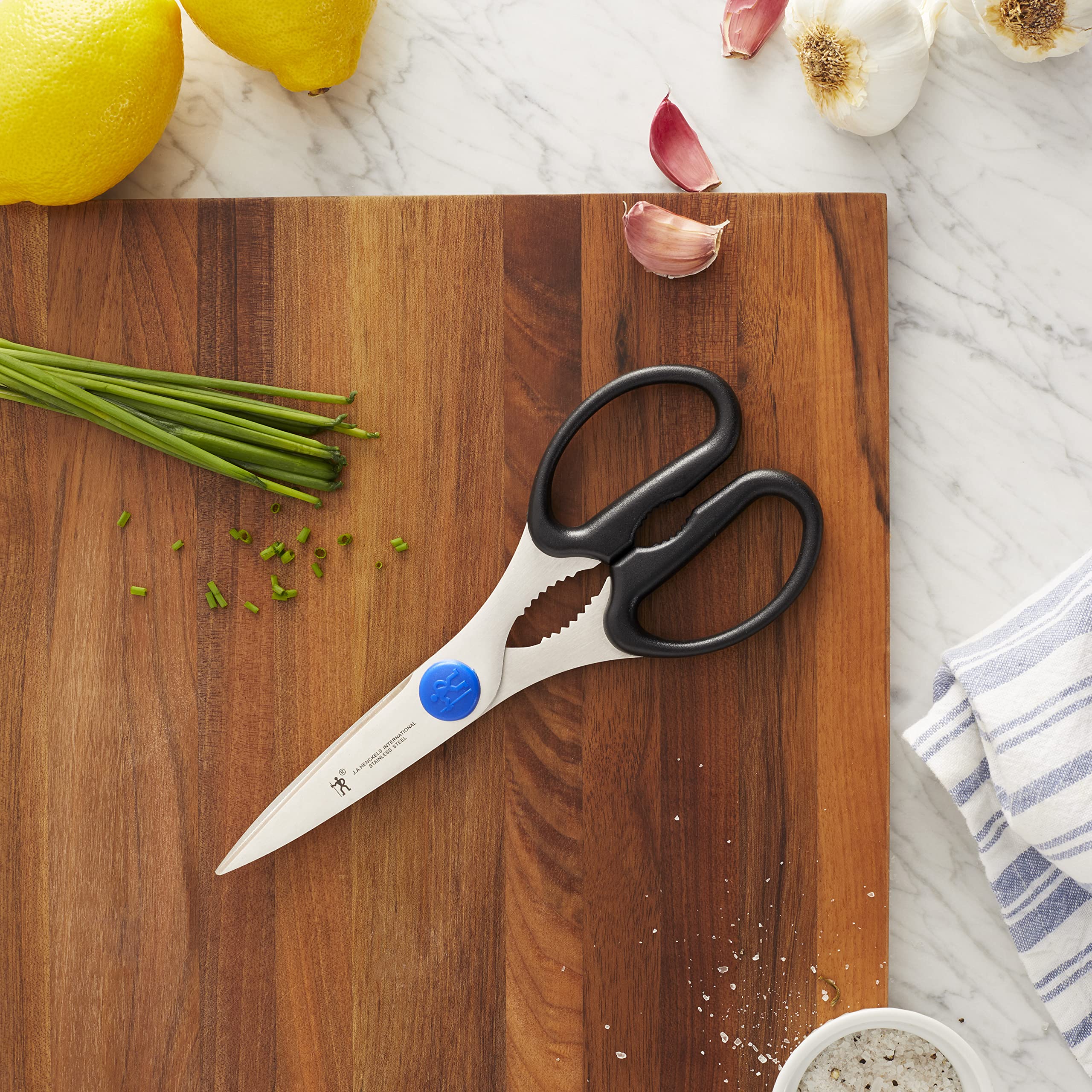 HENCKELS Take-Apart Kitchen Shears halves assembled for easy, thorough cleaning and hygienic care.