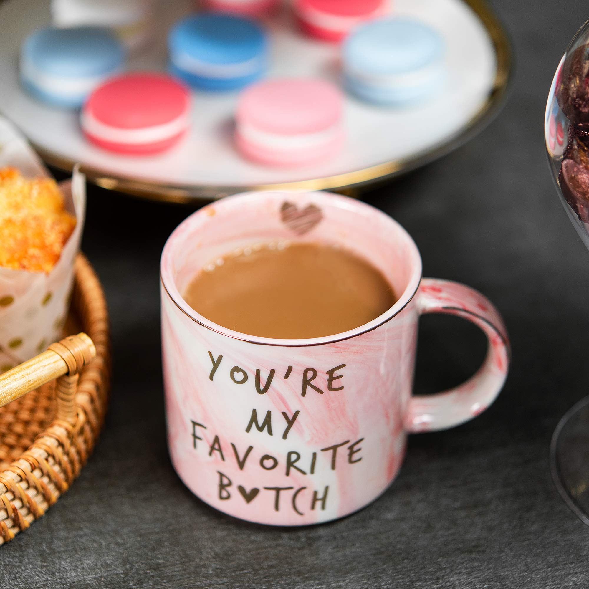 Hendson shiny pink ceramic cup for women, playful office accessory.