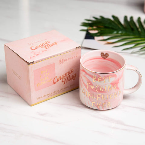 Hendson pink mug golden accents closeup adds a touch of glam to any kitchen