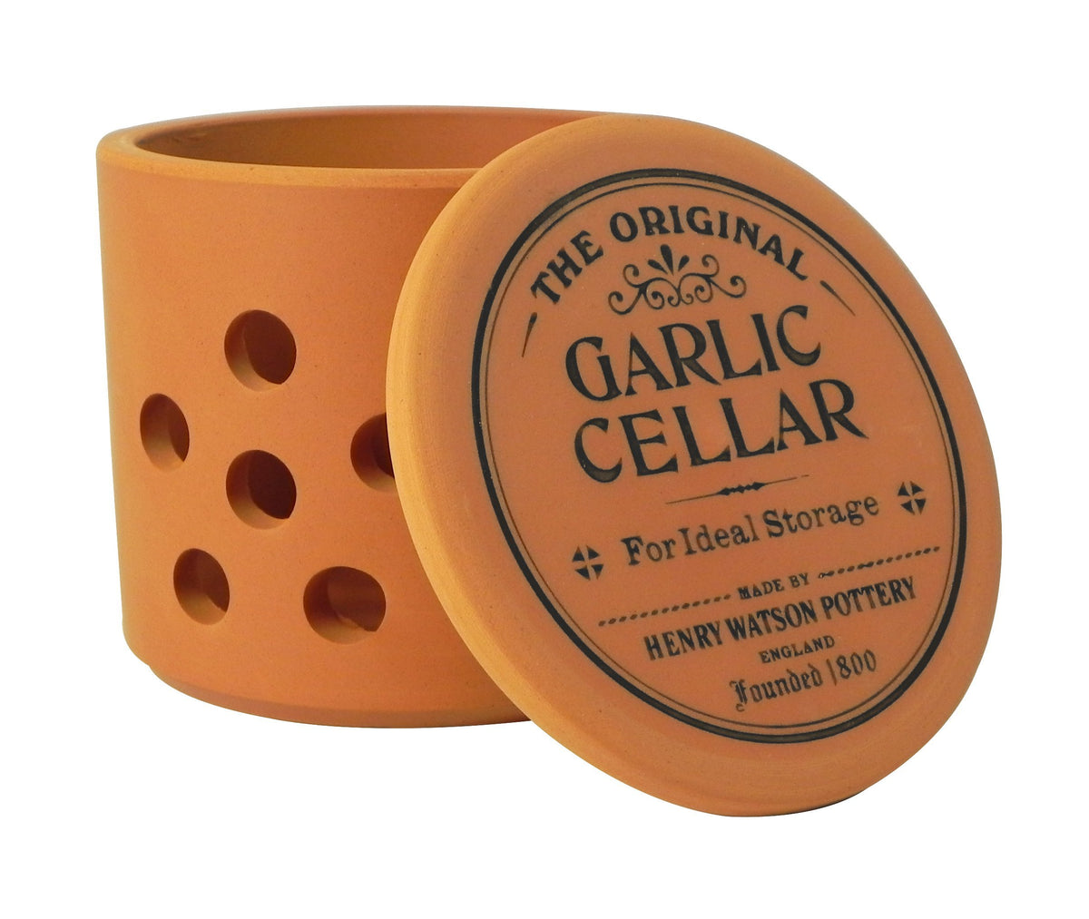 Henry Watson garlic keeper in terracotta keeps garlic fresh and ready for cooking