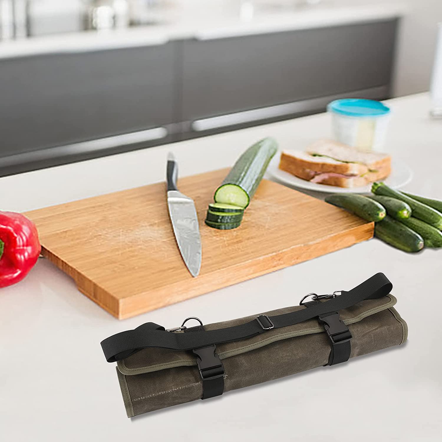 HERSENT in-use shot demonstrating safe carrying while cooking outdoors