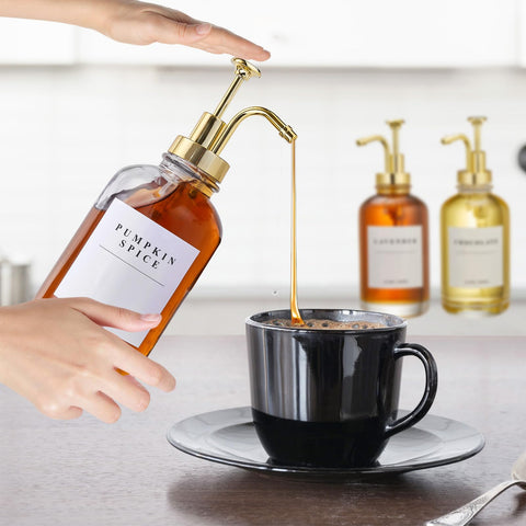 HHSME Coffee Syrup Dispenser Set — 4 Glass Bottles with Gold Pumps, 28 Labels, 2 Funnels, Bamboo Tray