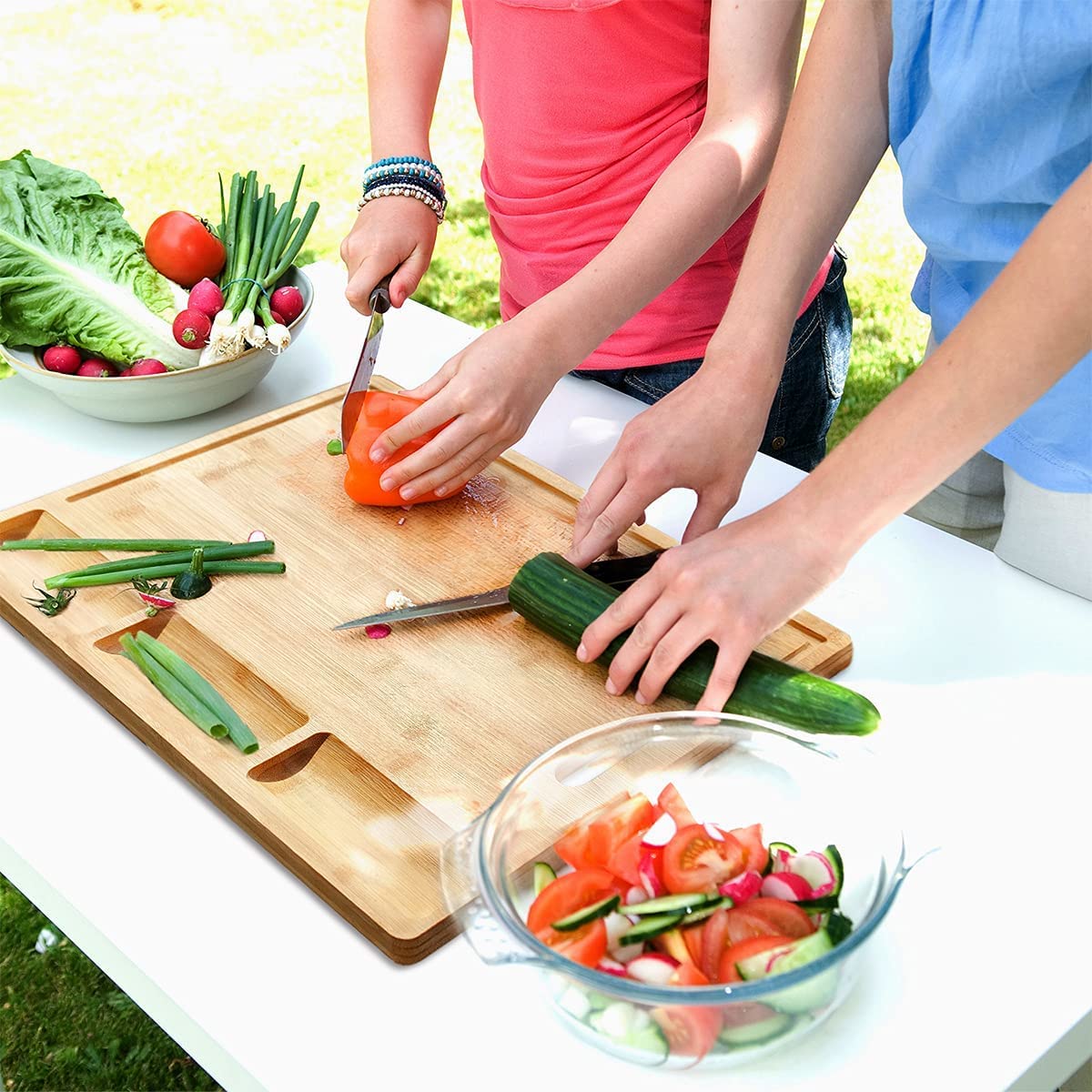 HHXRISE carving and serving board doubles as a meat and cheese tray.