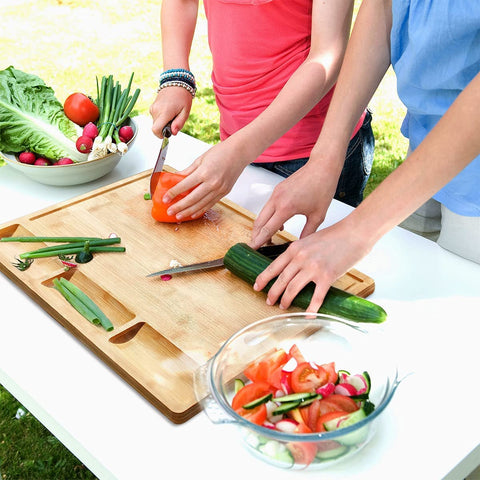 HHXRISE carving and serving board doubles as a meat and cheese tray.