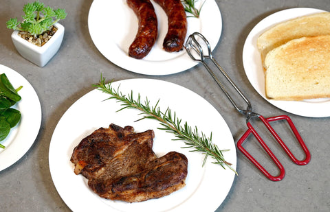 Hiash heat-resistant tongs keep hands safe while flipping hot foods.
