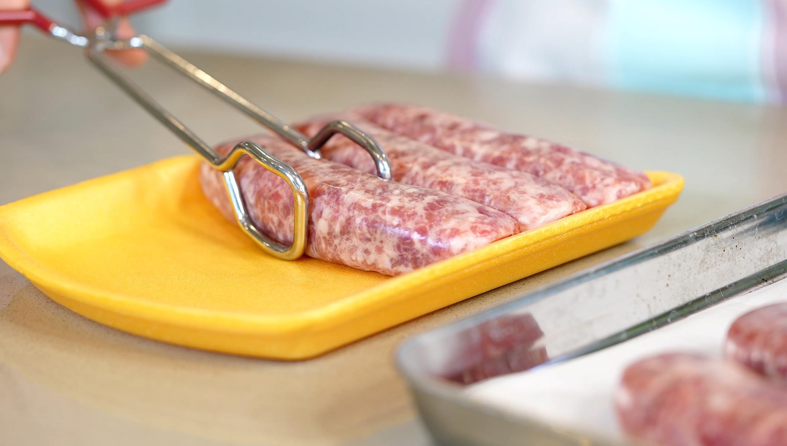Hiash tongs feature a scissor design for smooth, one-handed operation.