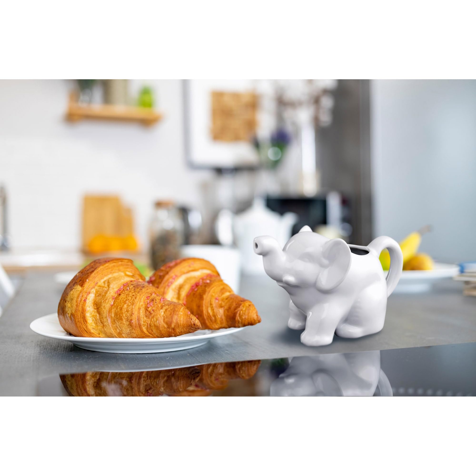 HIC Kitchen Elephant Creamer demonstrates 9-ounce capacity for multiple servings at table.