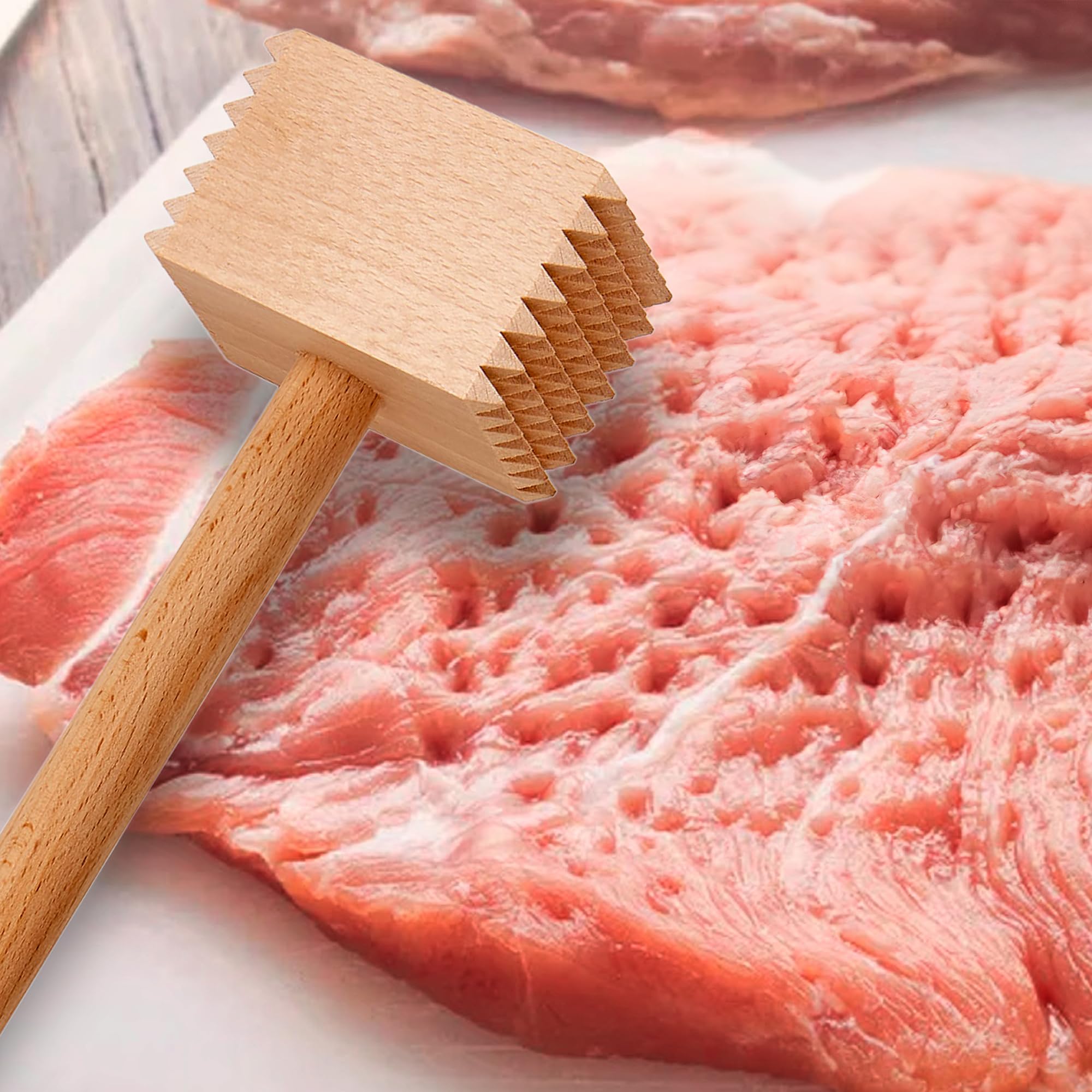 HIC Kitchen meat tenderizer smooth side creates even, thin cutlets for veal, poultry, or fish.
