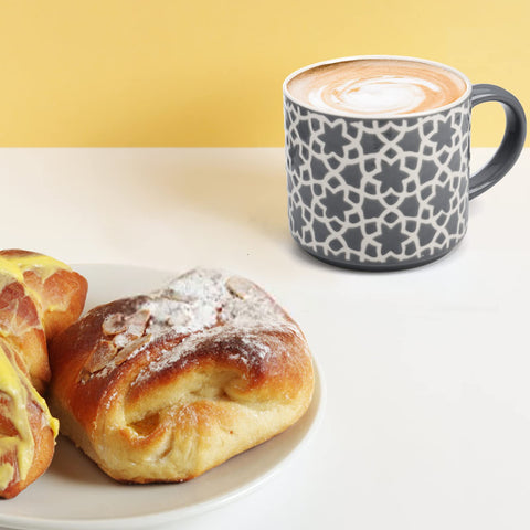 Stylish patterned mugs that complement various kitchen styles.