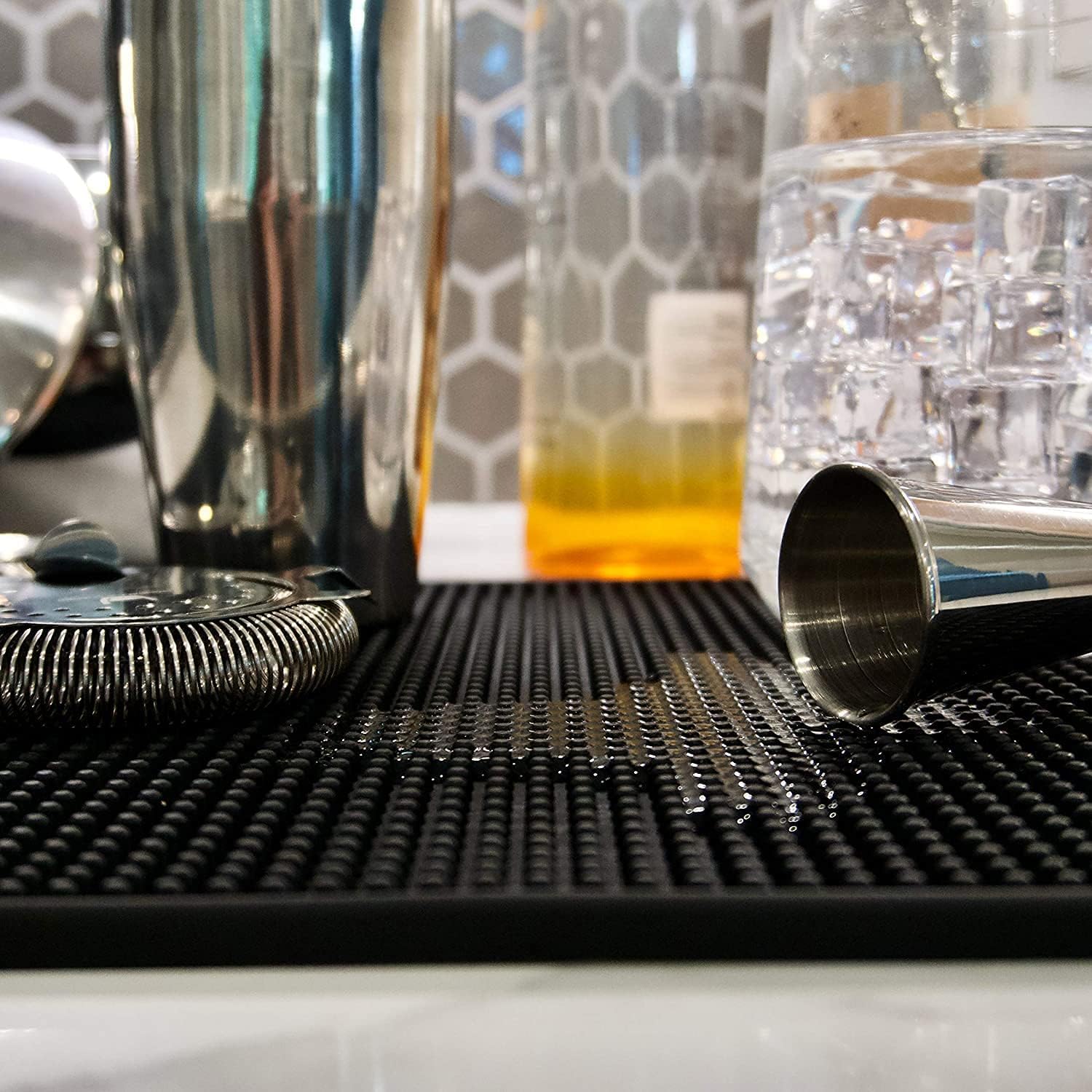 Highball & Chaser bar mat is dishwasher safe for quick cleanups.