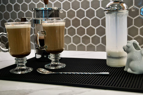 Highball & Chaser thick bar mat resists wear during busy service.