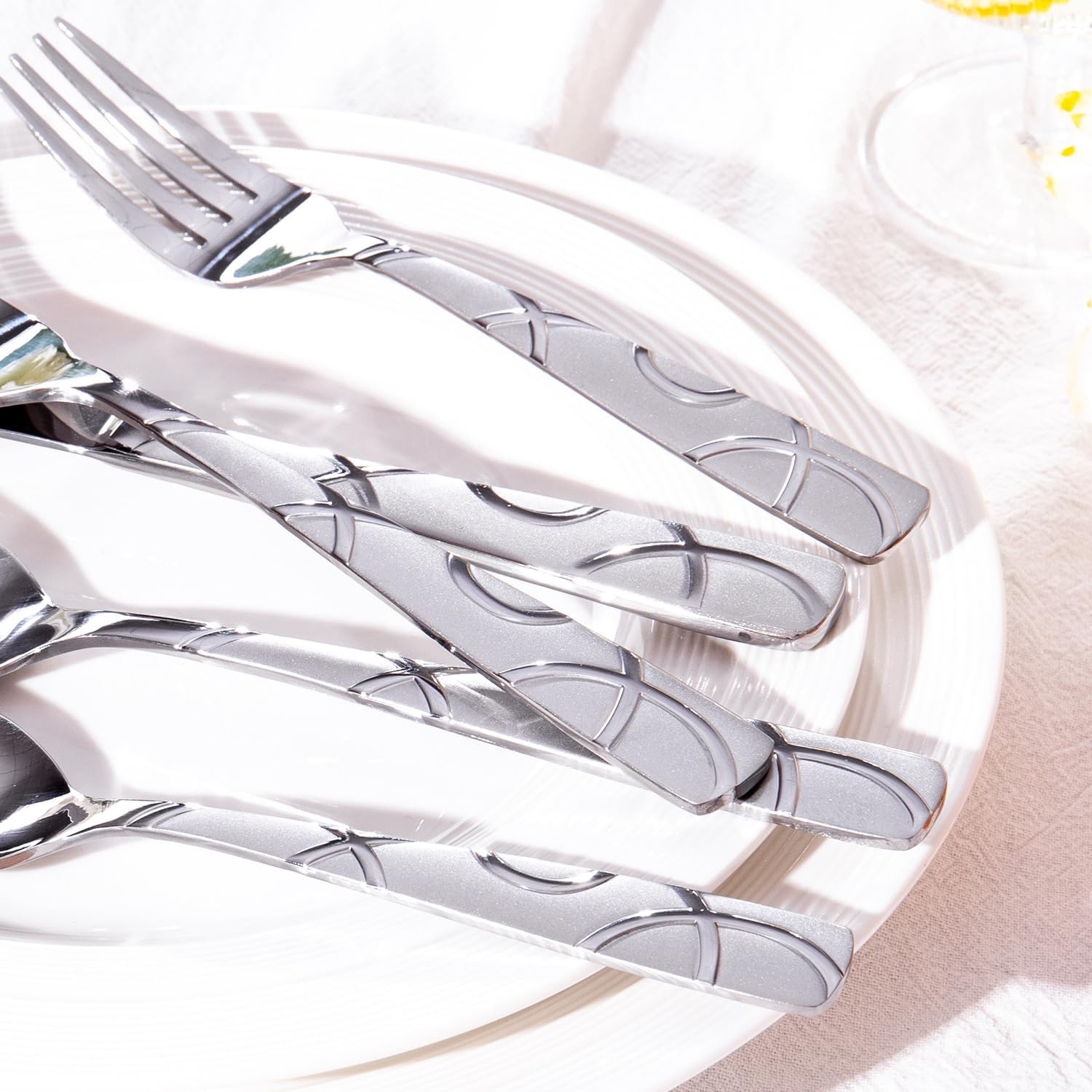 HIKAA dinner fork showcases flower pattern, balanced weight for comfortable dining.