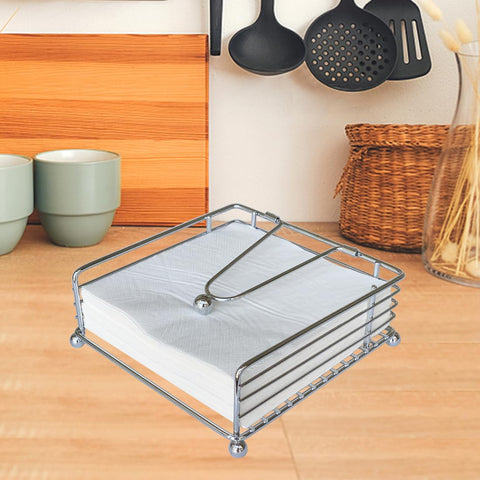 Hiwafifi napkin holder on table keeps napkins organized.