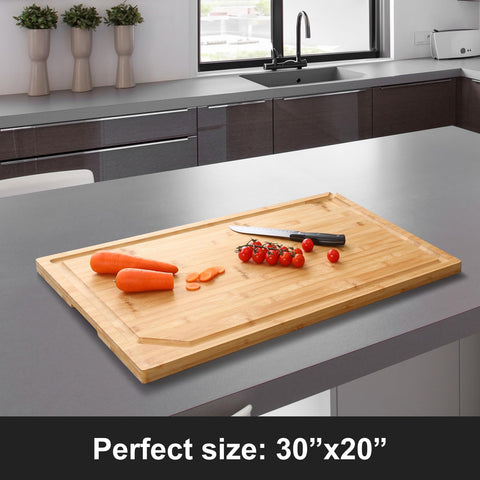 HIWARE bamboo cutting board with juice groove and spout for mess-free prep.