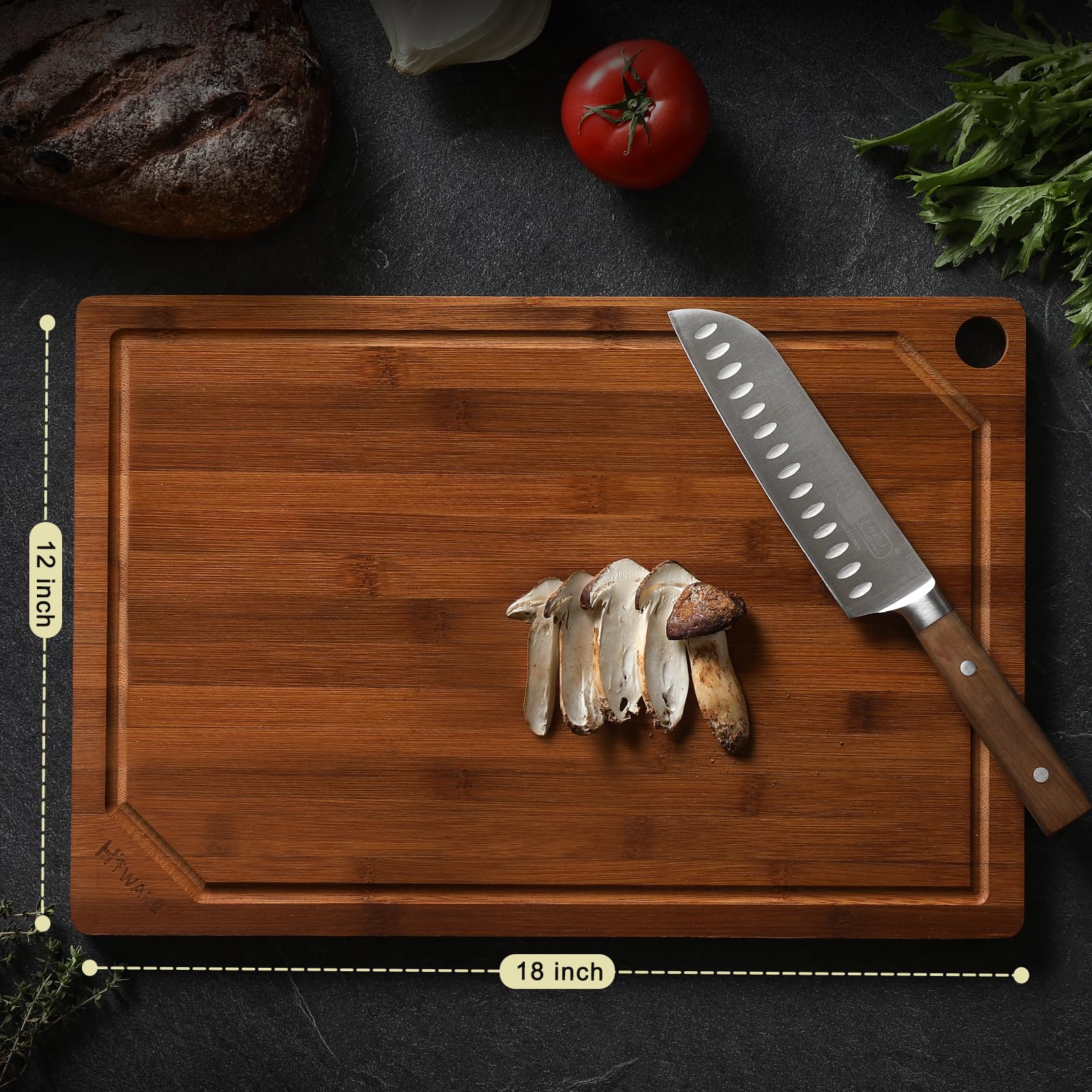 Hiware bamboo cutting board with juice groove catches liquids during chopping.