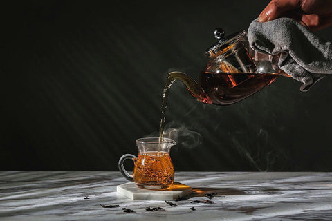 HIWARE glass teapot ready for microwave reheating of tea.