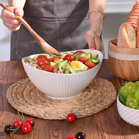 Hoilse oval bowl with deep design supports layered salads