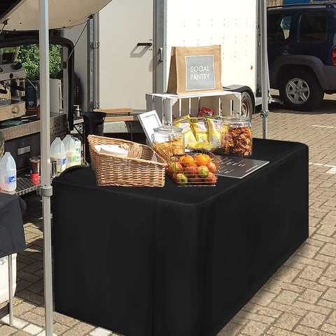 HolidayIdeas fitted tablecloth conceals legs and cords for tidy presentation