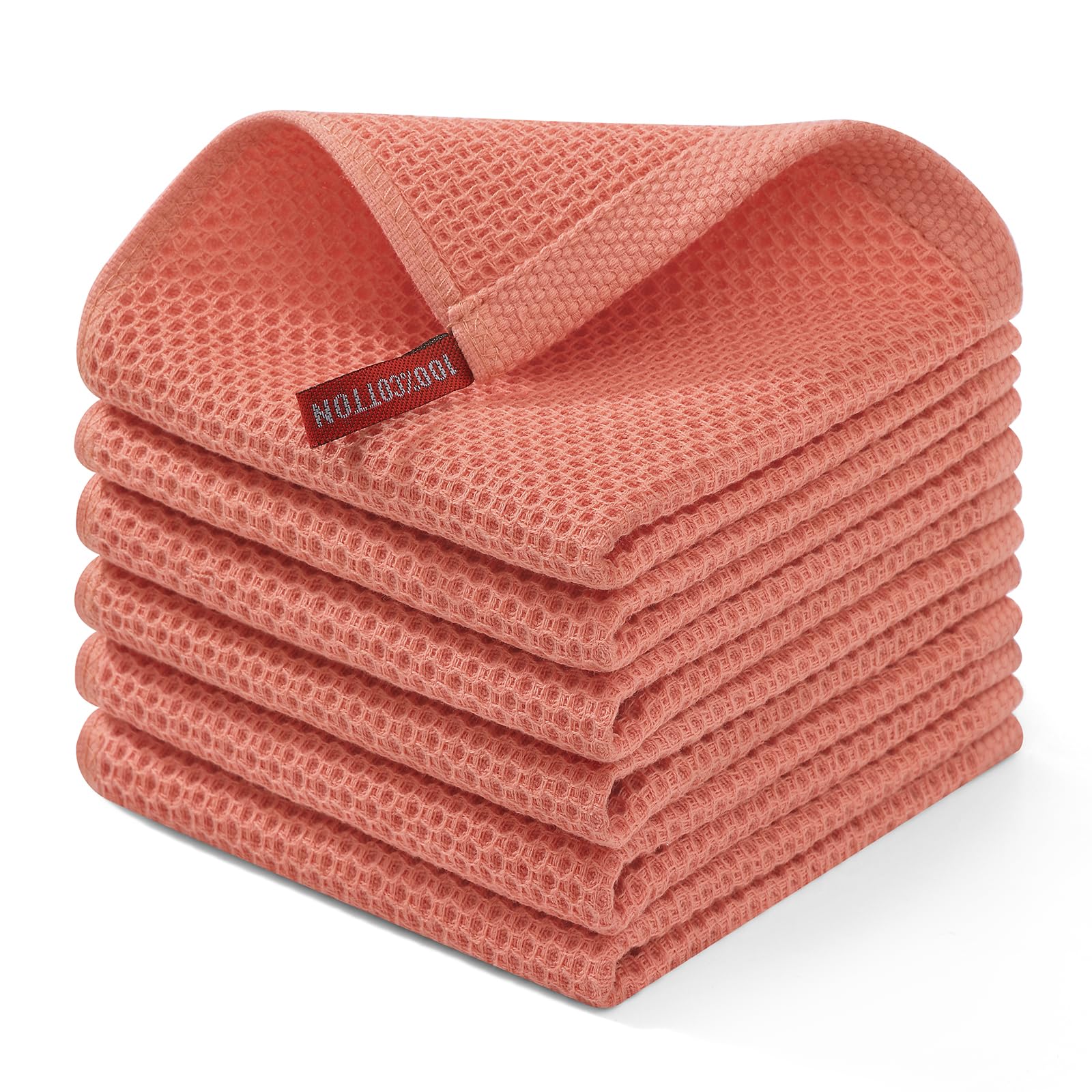 Homaxy 100% cotton waffle dishcloth in coral, ultra-absorbent for quick drying.