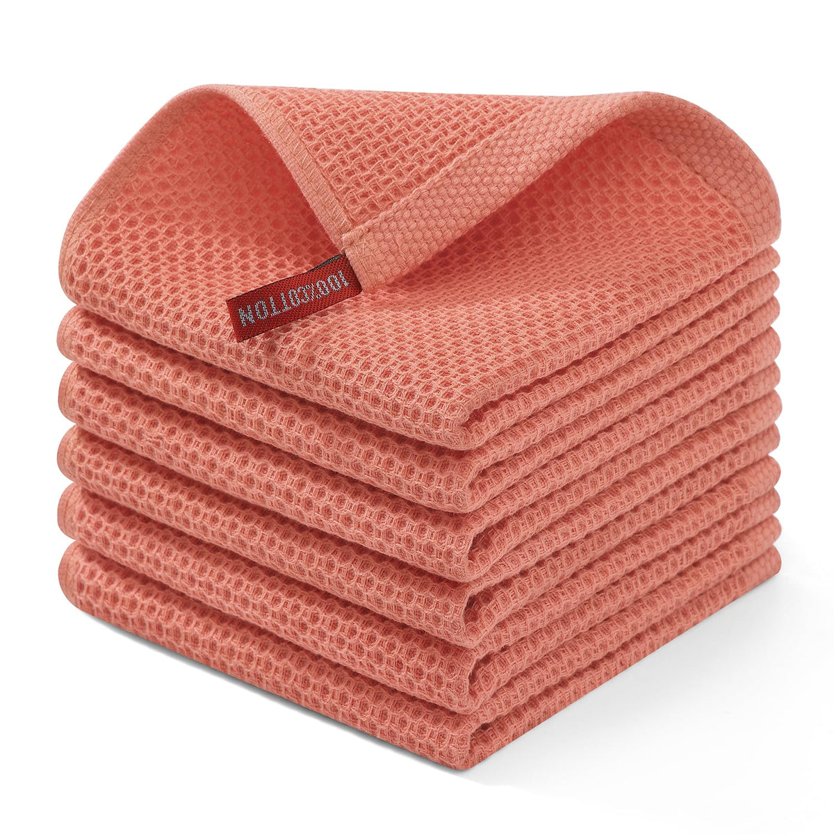 Homaxy 100% cotton waffle dishcloth in coral, ultra-absorbent for quick drying.