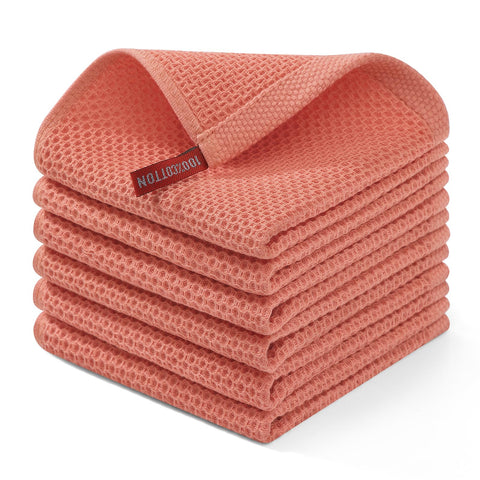 Homaxy 100% cotton waffle dishcloth in coral, ultra-absorbent for quick drying.