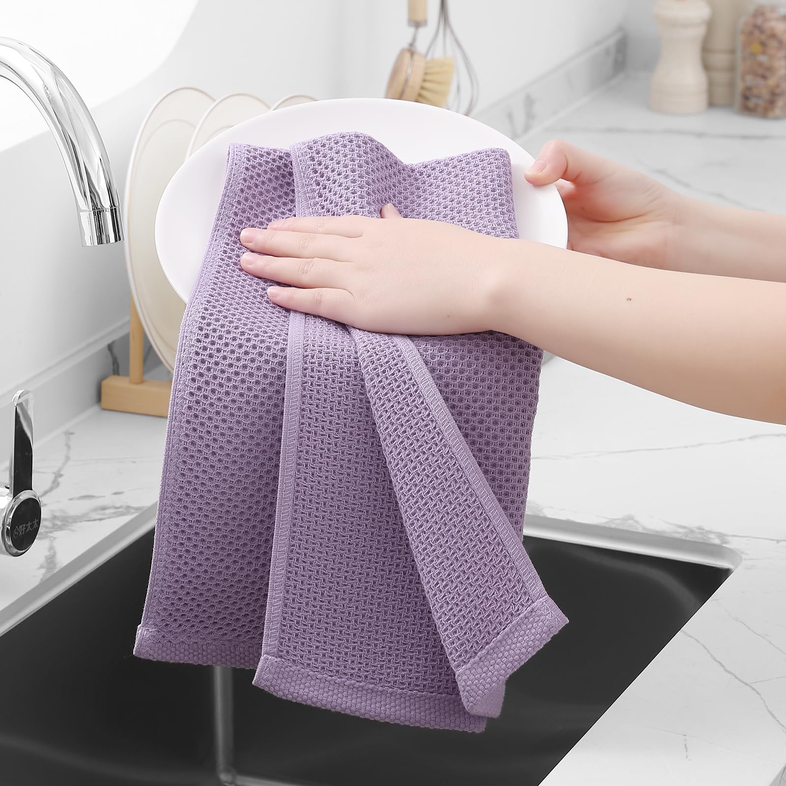 Homaxy quick-dry dish towels in use for wiping spills and drying cookware