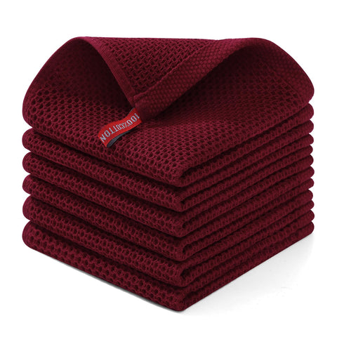 Homaxy 100 percent cotton waffle dishcloth folded for gentle drying of delicate cookware.