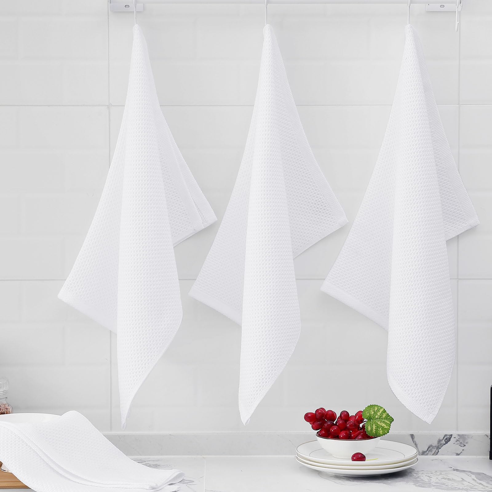 Homaxy towels folded on a rack demonstrating size and versatility.