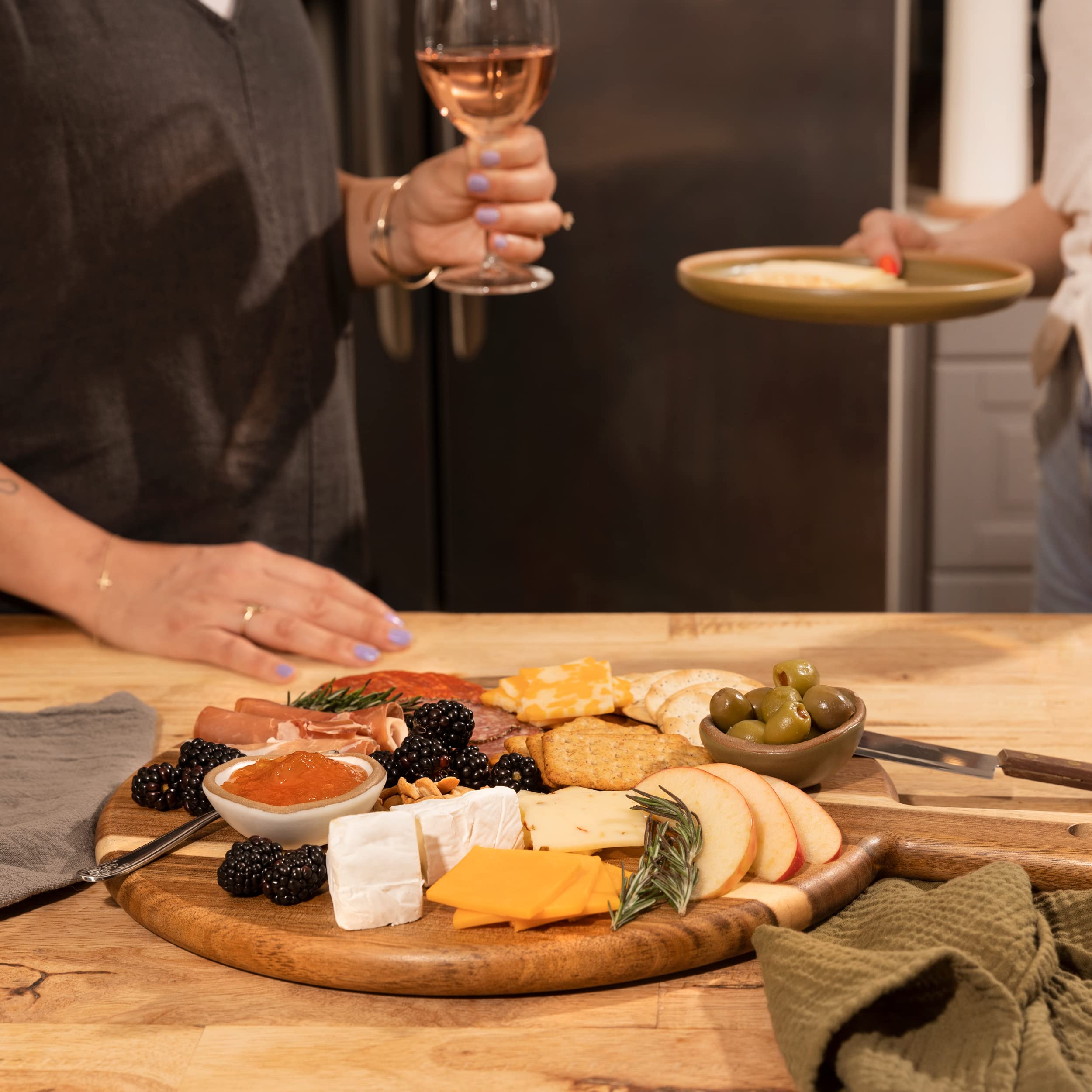 Home Beets acacia board with knife-ready surface, versatile for chopping and presenting.