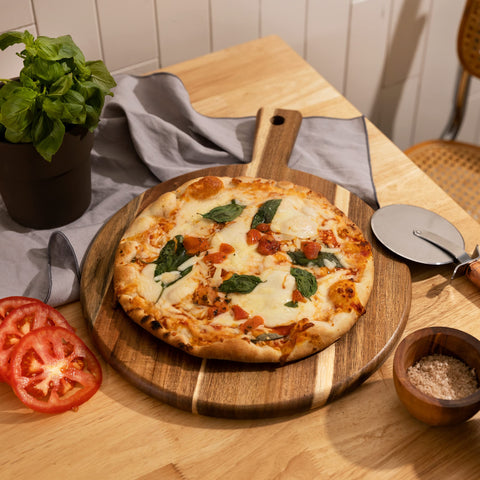 Home Beets acacia wood tone enhances farmhouse kitchen aesthetics during gatherings.