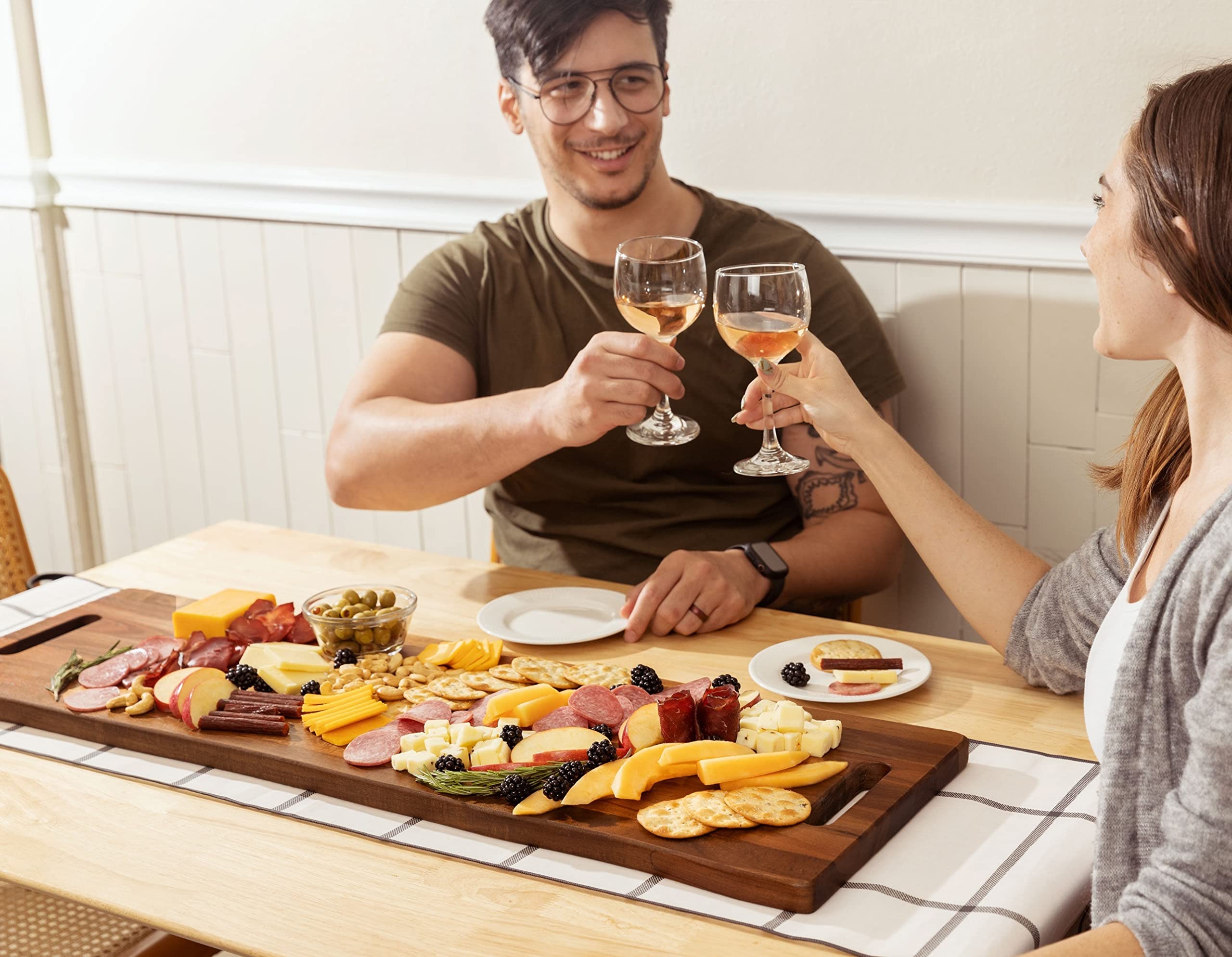 Home Beets kitchen dining display – large board on table for gatherings.