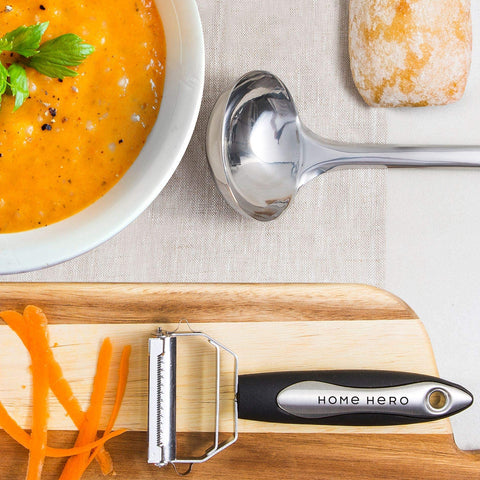 Home Hero slotted turner with heat-resistant silicone edge for flipping and sautéing.