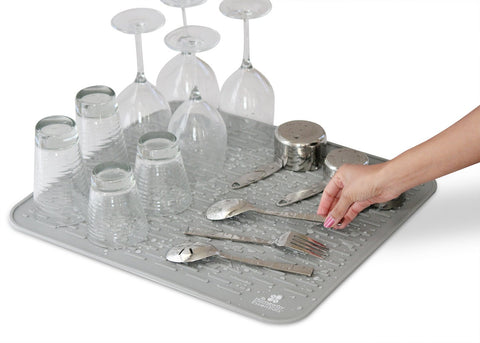 Homeway Essentials silicone drying mat rolled for compact storage in small kitchens.