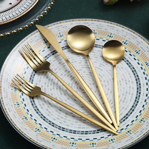 HOMQUEN matte gold dinner forks shine on a place setting