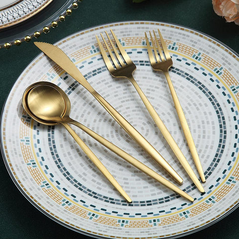HOMQUEN matte gold dinner spoons shown with soup and dessert