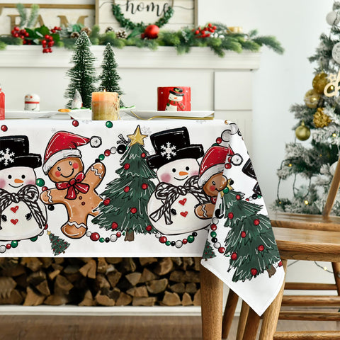 Horaldaily Christmas tablecloth shown on a full table setup for a festive dinner.