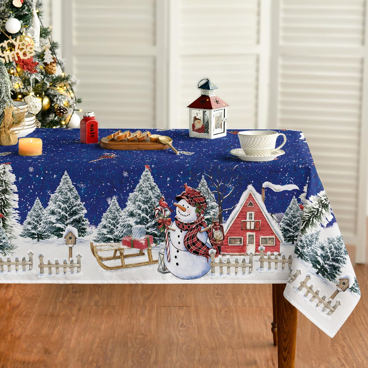 Horaldaily Christmas tablecloth with snowman design adds festive charm while protecting your table.