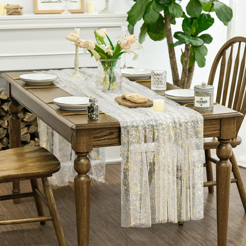 Close-up of golden sequin glitter foil embellishments on Horaldaily tablecloth.