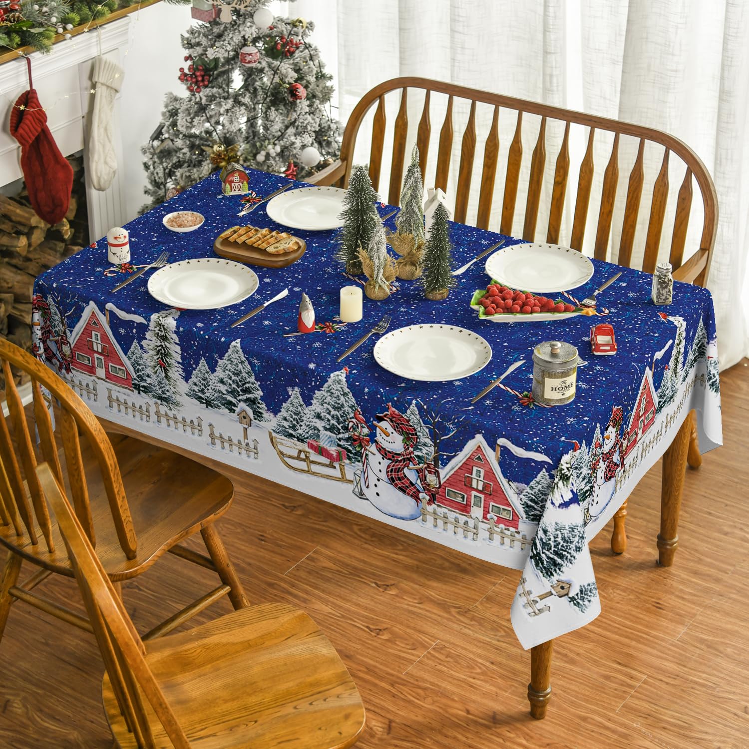 Horaldaily tablecloth features blue winter trees to brighten holiday dining.