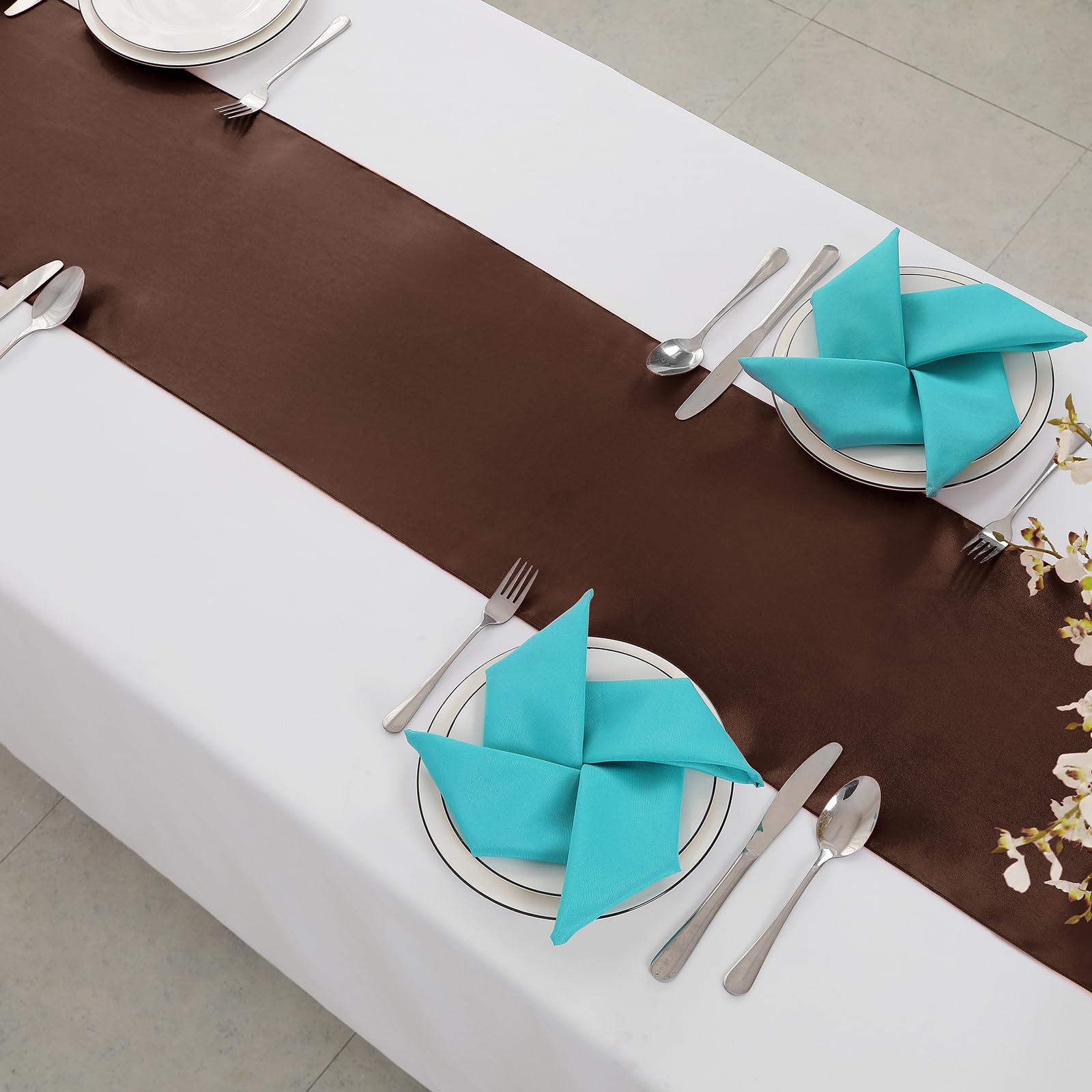 Horbaunal satin runner used as chair sash for romantic DIY decor.
