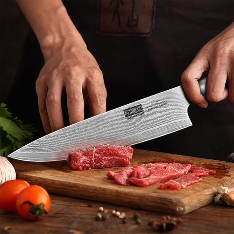 Ergonomic olive wood handle detail on HOSHANHO Damascus knife