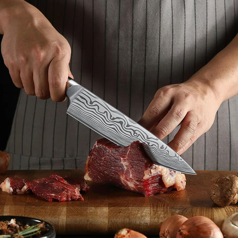 HOSHANHO knife in action on a cutting board during meal prep.