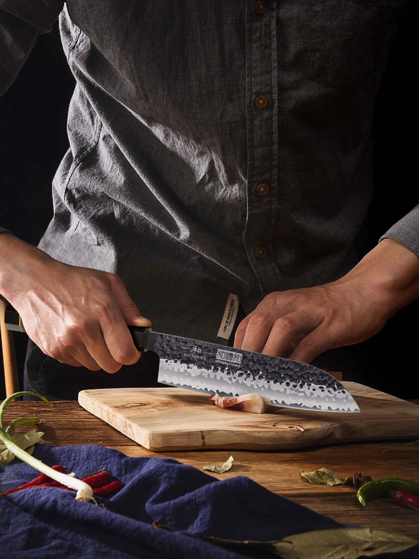 HOSHANHO Santoku knife with copper wire handle, a distinctive craft detail.