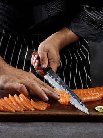HOSHANHO knife slicing tofu and soft ingredients with controlled, gentle cuts.