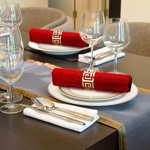 Hotop gold napkin rings showcase hollow design on a formal dining setup.