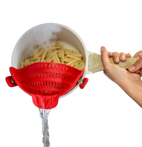 Houseify Perfect Pasta Pal clip-on strainer on a pot for mess-free draining.