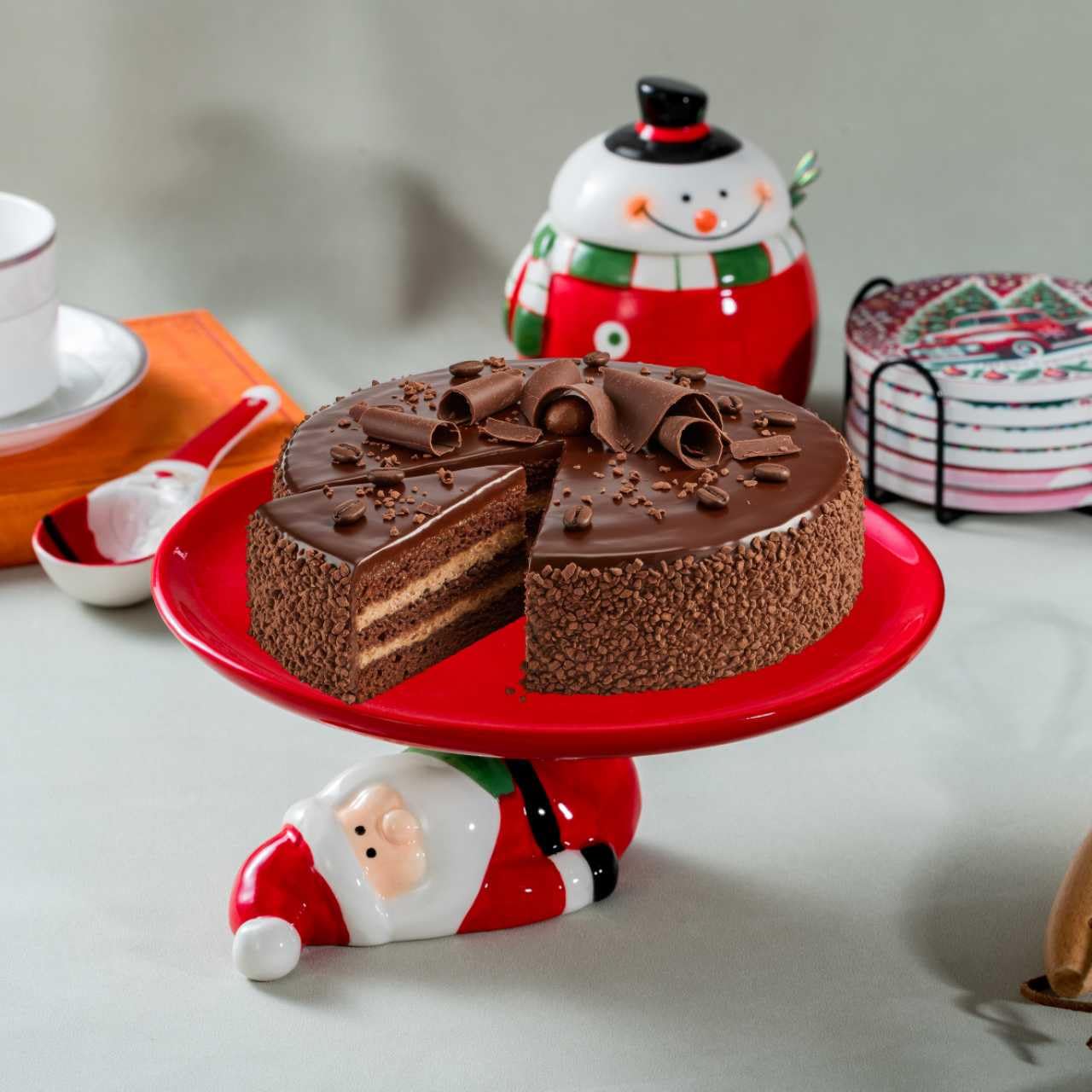 HPYNPES Santa cake stand used as a table centerpiece for holidays.